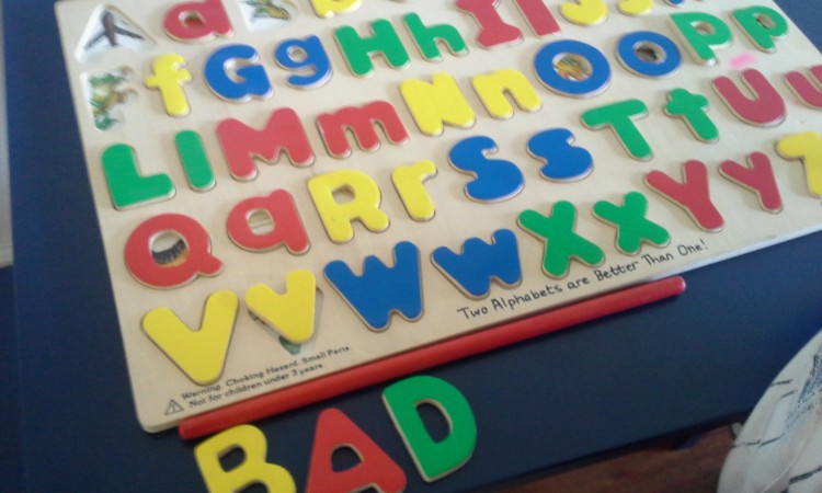 spelling with alphabet puzzle